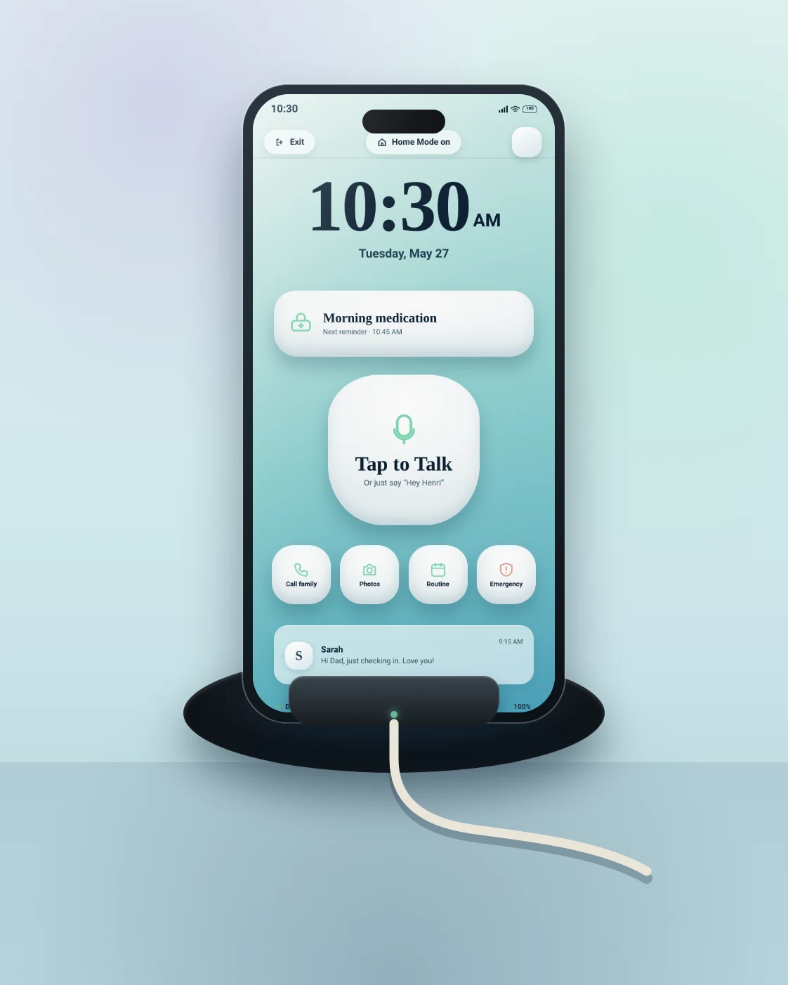 Henri Home: the phone docked, showing the time and the next reminder